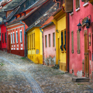 Beautiful cityscape of colorful european street in old town Sighisoara in Transylvania, Romania